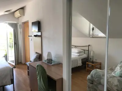 Krevet ili kreveti u jedinici u objektu Pink Inn