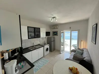 Kuhinja ili čajna kuhinja u objektu Apartment Merlin