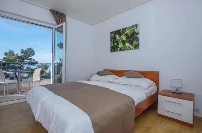 Krevet ili kreveti u jedinici u objektu Villa Dalmatia Apartments
