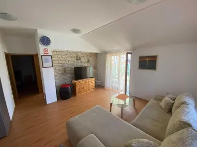 TV i/ili zabavni centar u objektu Apartments Hodak - Apartment with Sea View