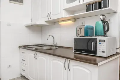 Kuhinja ili čajna kuhinja u objektu Apartments and Room Napoli