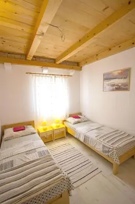 Krevet ili kreveti u jedinici u objektu Apartments Zeljko