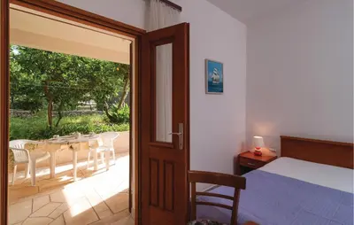 Krevet ili kreveti u jedinici u objektu One-Bedroom Apartment In Supetar