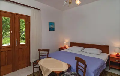 Krevet ili kreveti u jedinici u objektu One-Bedroom Apartment In Supetar