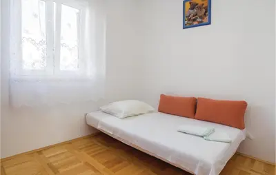 Krevet ili kreveti u jedinici u objektu Two-Bedroom Apartment In Supetar