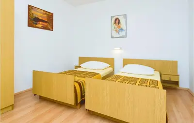 Krevet ili kreveti u jedinici u objektu Four-Bedroom Apartment In Omis