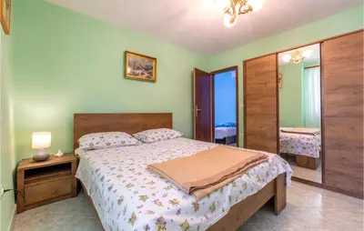 Krevet ili kreveti u jedinici u objektu One-Bedroom Apartment In Omis