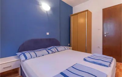 Krevet ili kreveti u jedinici u objektu Two-Bedroom Apartment In Makarska