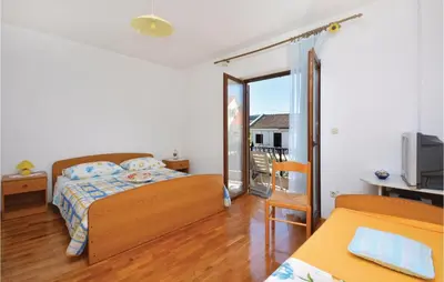 Krevet ili kreveti u jedinici u objektu One-Bedroom Apartment In Vrboska