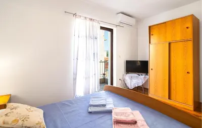 Krevet ili kreveti u jedinici u objektu One-Bedroom Apartment In Vrboska