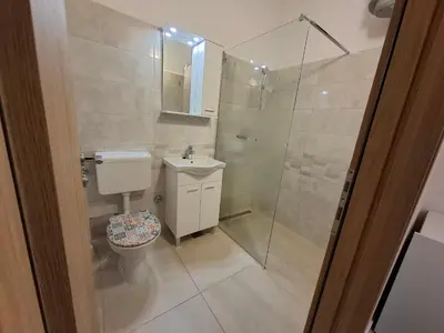 Kupaonica u objektu Apartments Kod Cara