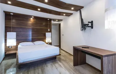 Krevet ili kreveti u jedinici u objektu Eight-Bedroom Holiday Home In Podstrana