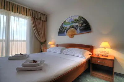 Krevet ili kreveti u jedinici u objektu Hotel Rosina