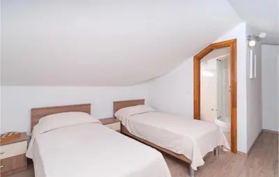 Krevet ili kreveti u jedinici u objektu Five-Bedroom Holiday Home In Donji Humag