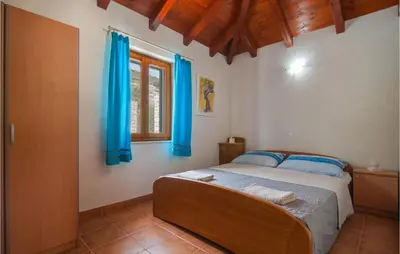 Krevet ili kreveti u jedinici u objektu Stunning Home In Postira