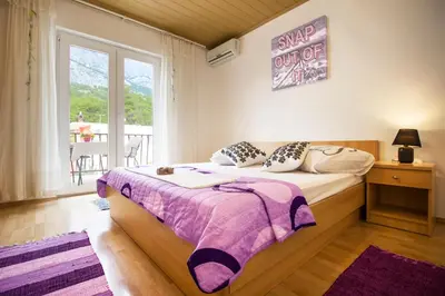 Krevet ili kreveti u jedinici u objektu Apartment & Rooms Marigold