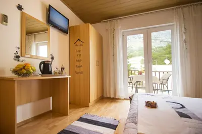 Krevet ili kreveti u jedinici u objektu Apartment & Rooms Marigold