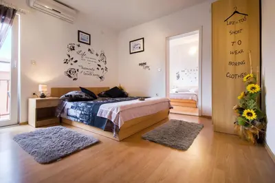 Krevet ili kreveti u jedinici u objektu Apartment & Rooms Marigold