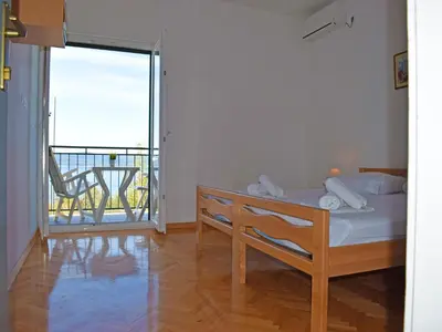 Krevet ili kreveti u jedinici u objektu Apartments Buljan