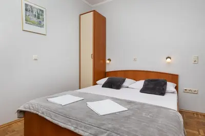 Krevet ili kreveti u jedinici u objektu Apartments by the sea Duce, Omis - 5973