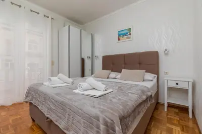 Krevet ili kreveti u jedinici u objektu Apartments by the sea Duce, Omis - 5973