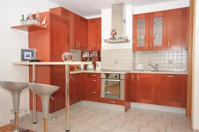 Kuhinja ili čajna kuhinja u objektu Apartments by the sea Omis - 7577