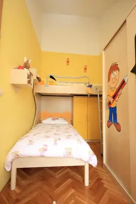 Krevet ili kreveti u jedinici u objektu Apartments by the sea Omis - 7577