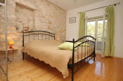 Krevet ili kreveti u jedinici u objektu Seaside secluded apartments Cove Karkavac - Scedro, Hvar - 8801