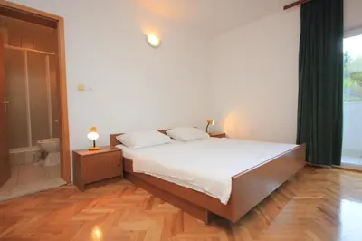 Krevet ili kreveti u jedinici u objektu Apartments by the sea Podstrana, Split - 8442