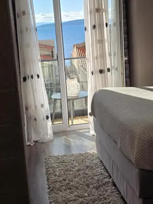 Krevet ili kreveti u jedinici u objektu Apartments iris
