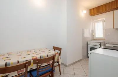 Kuhinja ili čajna kuhinja u objektu Apartments and Rooms Denis