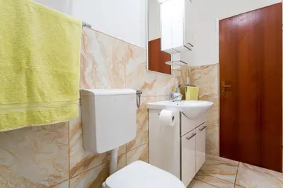 Kupaonica u objektu Apartments Ave