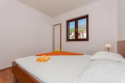 Krevet ili kreveti u jedinici u objektu Apartments Ricina