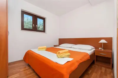 Krevet ili kreveti u jedinici u objektu Apartments Ricina