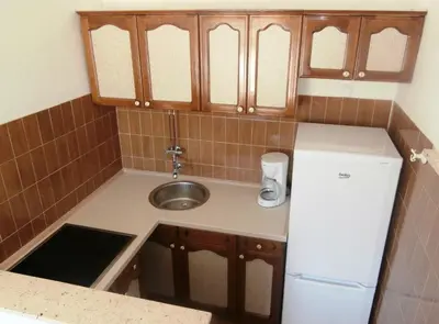 Kuhinja ili čajna kuhinja u objektu Panorama Postira Apartments
