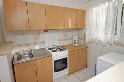 Kuhinja ili čajna kuhinja u objektu Apartments by the sea Postira, Brac - 3244
