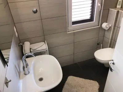 Kupaonica u objektu Apartments Vedran