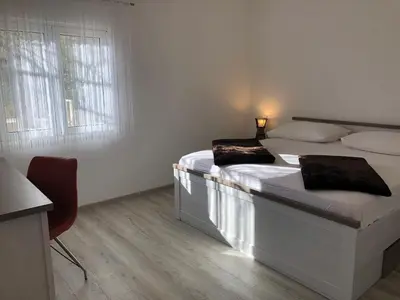 Krevet ili kreveti u jedinici u objektu Apartments Vedran