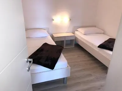 Krevet ili kreveti u jedinici u objektu Apartments Vedran