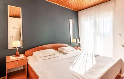 Krevet ili kreveti u jedinici u objektu Two-Bedroom Apartment In Nemira