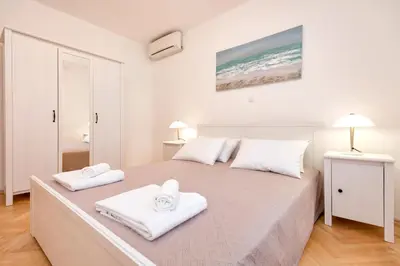 Krevet ili kreveti u jedinici u objektu Pine Beach Villa