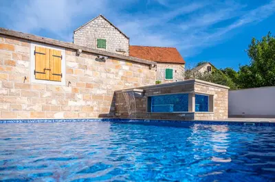 Bazen u objektu Luxury Villa David with a private boat, heated pool, jacuzzi and sauna ili u blizini