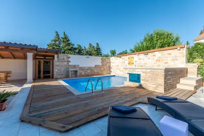Bazen u objektu Luxury Villa David with a private boat, heated pool, jacuzzi and sauna ili u blizini