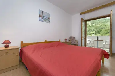 Krevet ili kreveti u jedinici u objektu Family-friendly apartments with swimming pool Baska Voda, Makarska - 12442