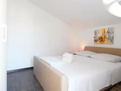 Krevet ili kreveti u jedinici u objektu Apartments Andrea