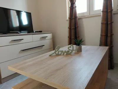 TV i/ili zabavni centar u objektu Apartments Karlo