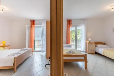 Krevet ili kreveti u jedinici u objektu Apartments Darija