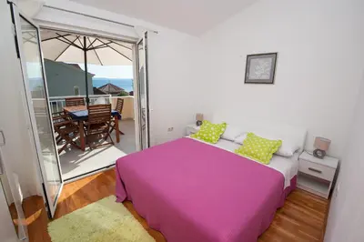 Krevet ili kreveti u jedinici u objektu Apartments with a parking space Podstrana, Split - 12664