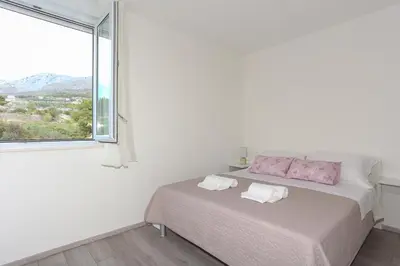 Krevet ili kreveti u jedinici u objektu Apartments with a parking space Podstrana, Split - 12837