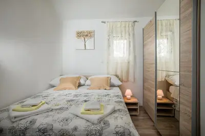 Krevet ili kreveti u jedinici u objektu Apartments Essentia